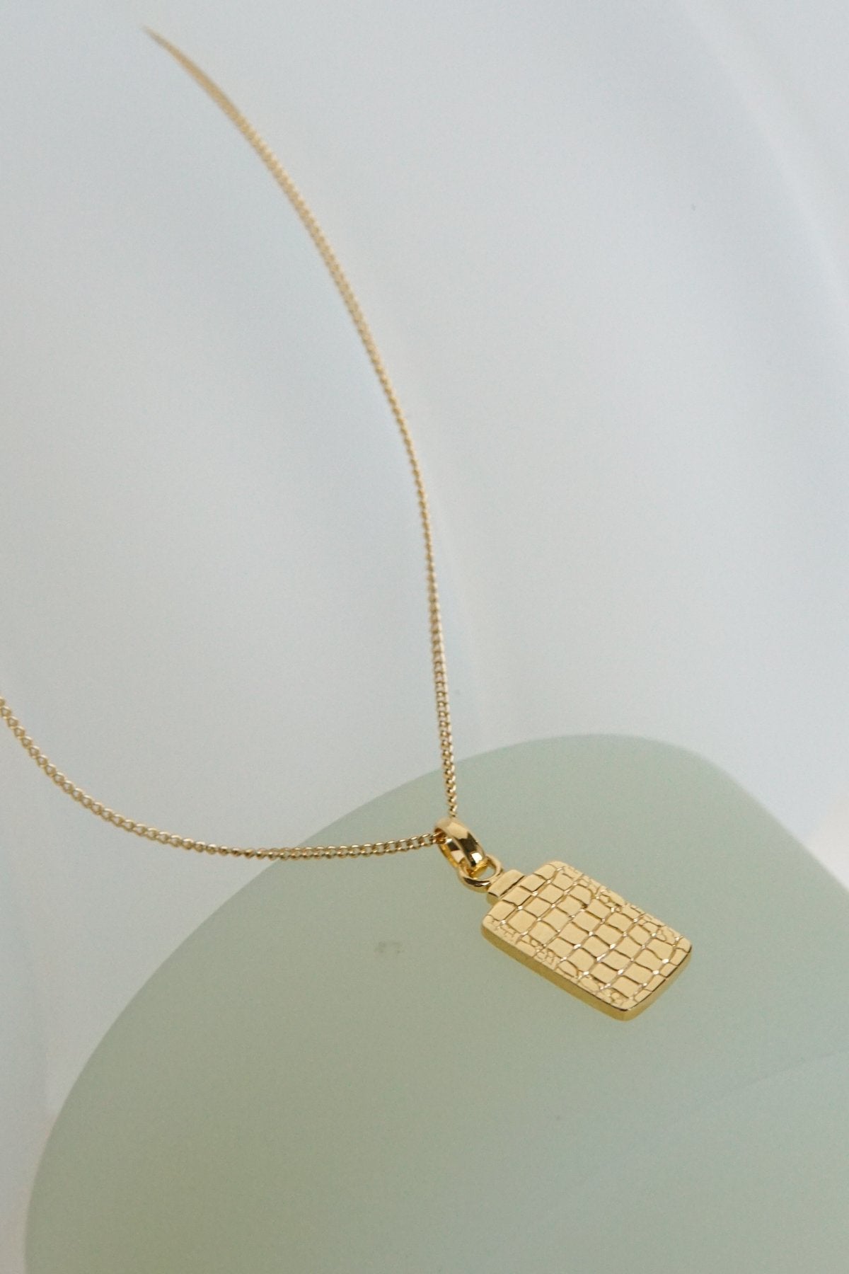 Crocodile skin pendant gold plated-abc