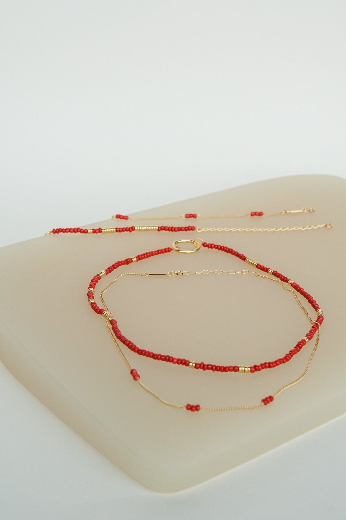 Triple red beads bracelet gold plated-Bracelet-wildthings_collectables-Gold plated---abc
