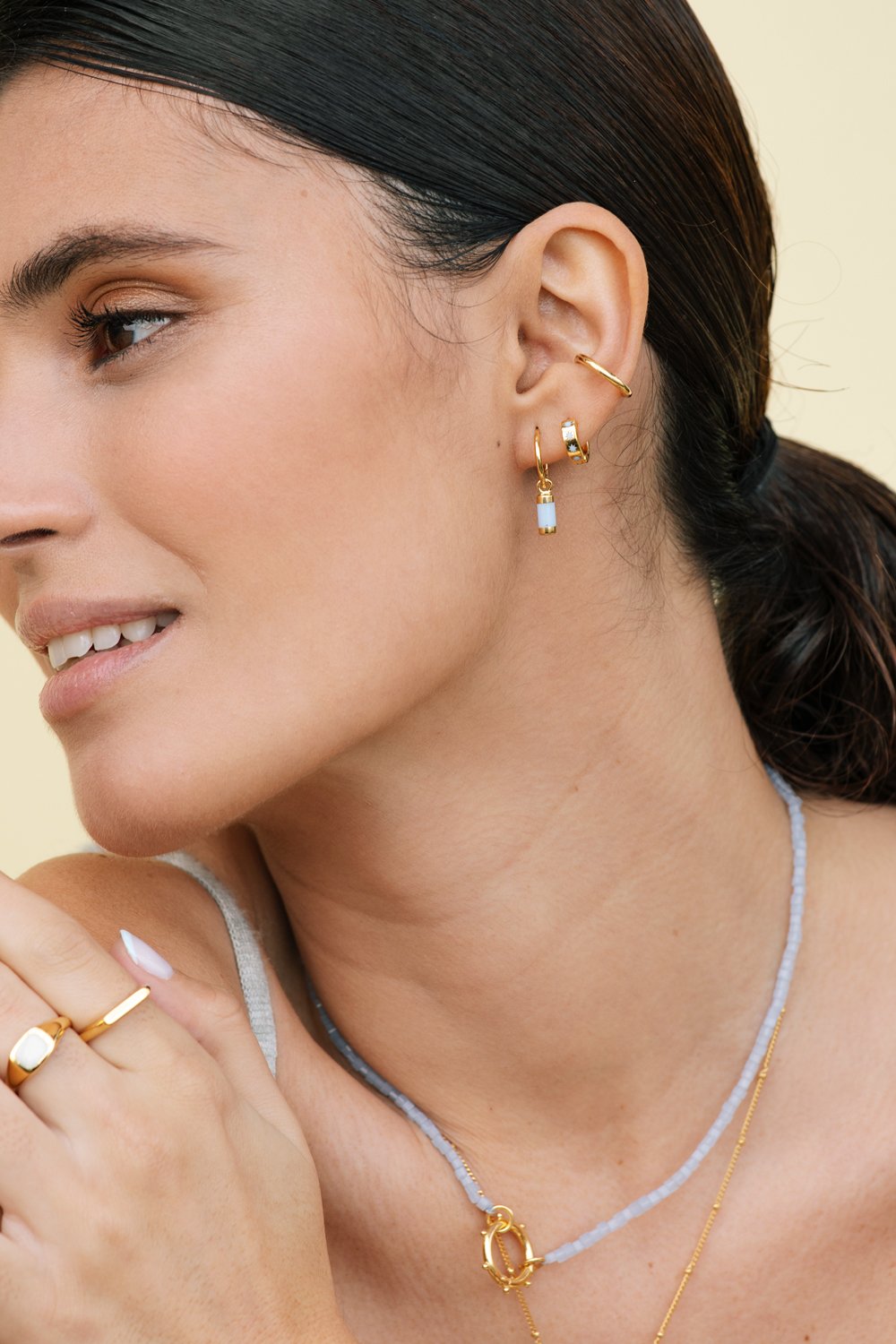 Blue sky star huggie gold plated-abc