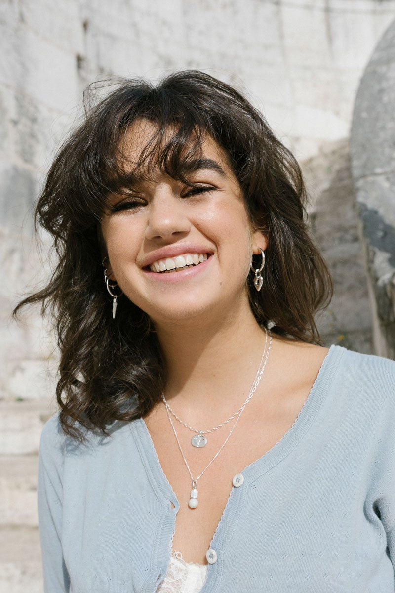 Face sculpture pendant silver-abc